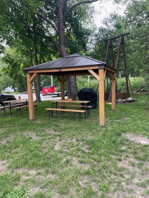 Gazebo with picnic tables and grill